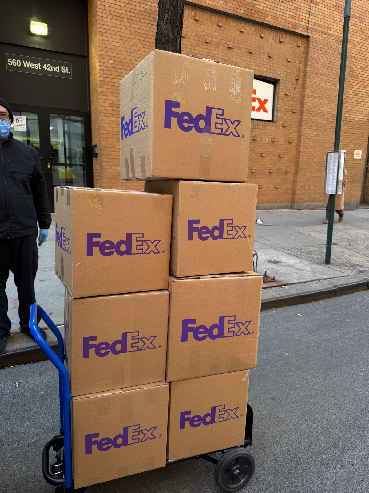 Packed relief boxes stacked on a hand truck