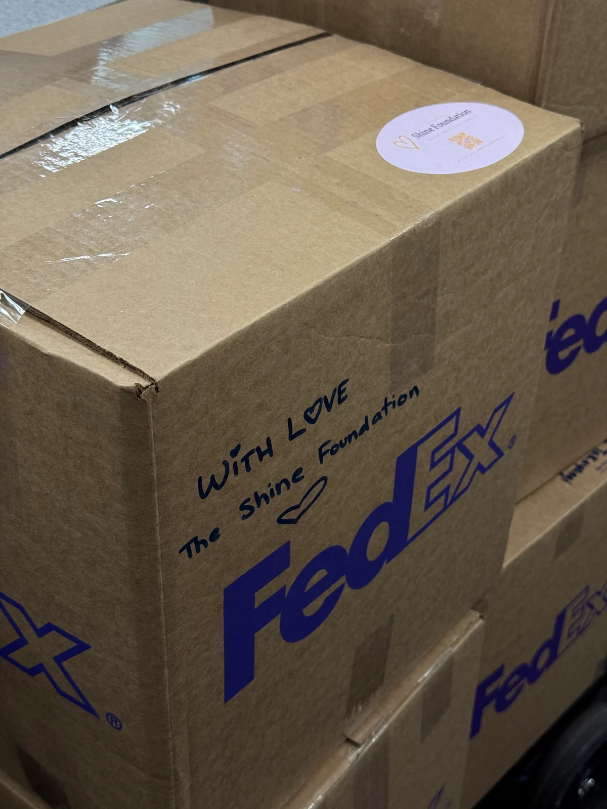 A sealed box of supplies prepared for shipment