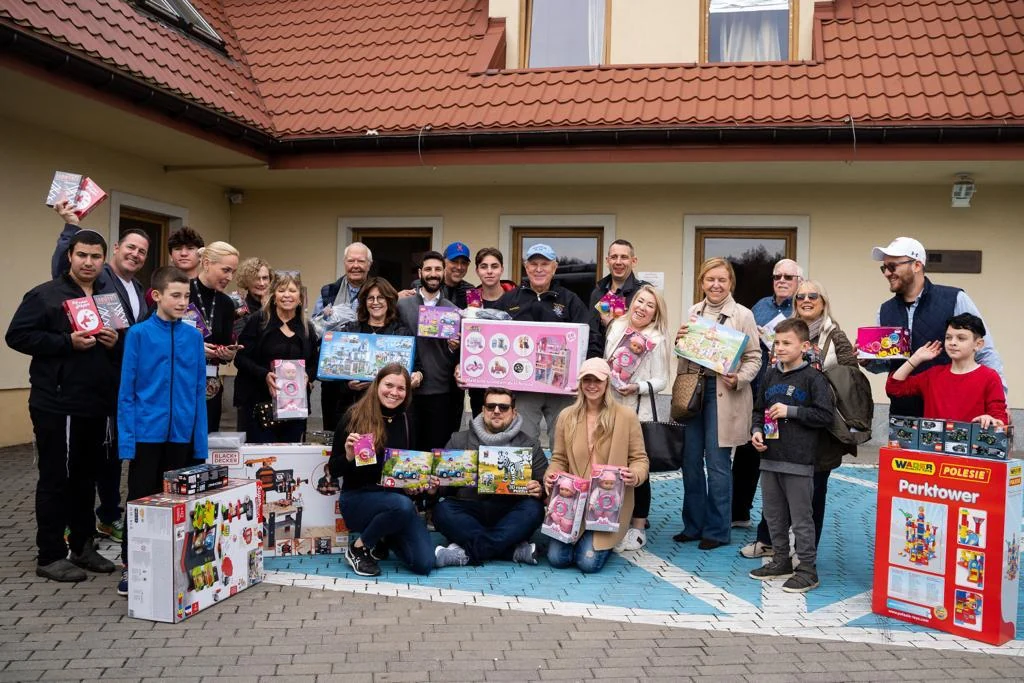 The group gathered with donated gifts in Poland